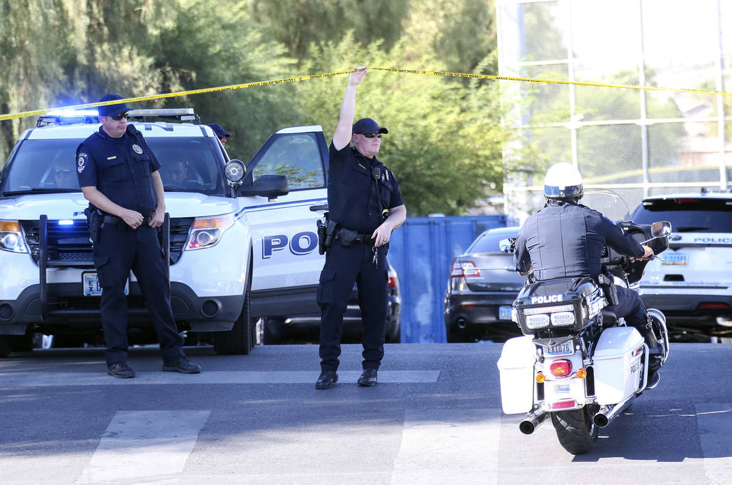 North Las Vegas Police police investigate a homicide at Canyon Springs High School in North Las Vegas on Tuesday, Sept. 11, 2018. Richard Brian Las Vegas Review-Journal @vegasphotograph