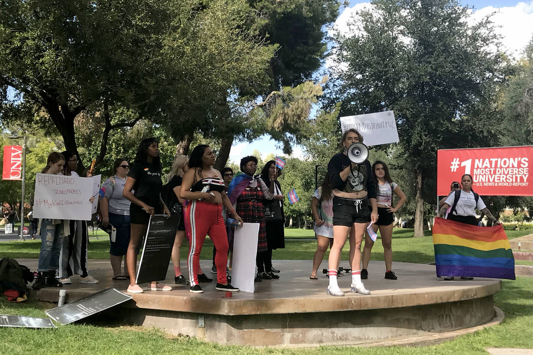 A group of about 20 students held a protest on UNLV campus on Thursday, Oct. 11, 2018, in support of UNLV student Alexander Kostan, center, who claims he was kicked out of a Kappa Sigma fraternit ...