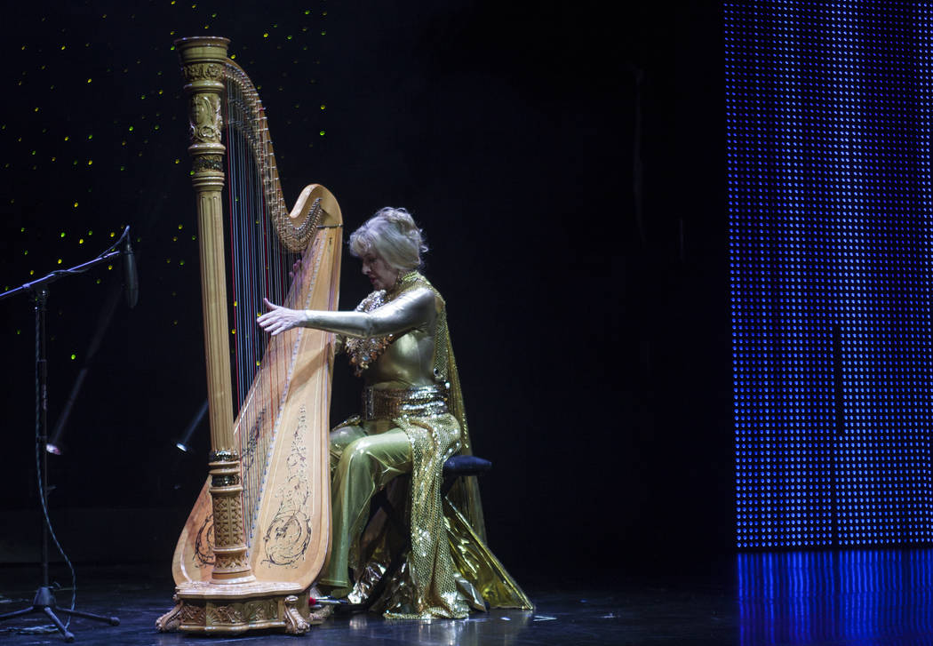 Ms. Super Senior Joanie Helgesen plays the harp during the talent portion of the Miss Senior Universe Pageant at the Fabulous Saxe Theatre in Las Vegas, Saturday, Nov. 3, 2018. Rachel Aston Las Ve ...