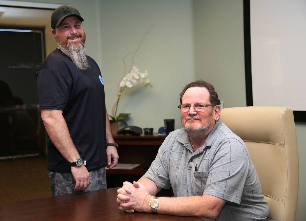 Veterans Action Group's Board Member Ryan Stojack, left, and Director Jerry Adams, during a boa ...