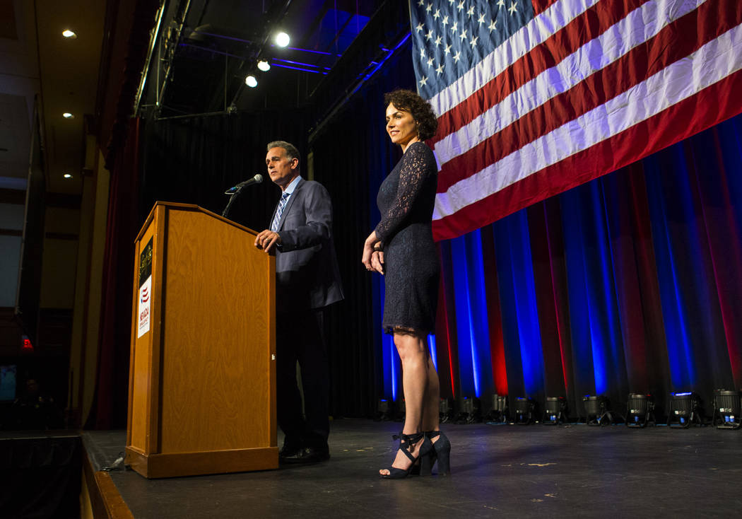 Amy Tarkanian looks on as her husband Danny Tarkanian, Republican candidate for the 3rd Congressional District, speaks after conceding to Democratic candidate Susie Lee during the Nevada Republica ...