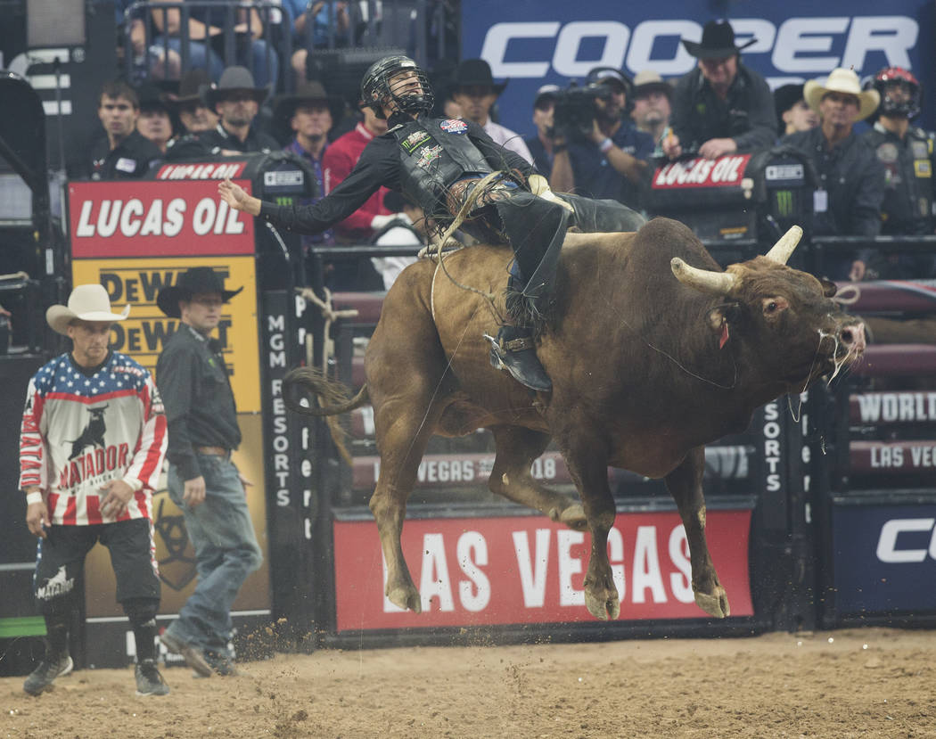 Colton Jesse rides "Frequent Flyer" during the Professional Bull Riders World Finals on Thursday, November 8, 2018, at T-Mobile Arena, in Las Vegas. Benjamin Hager Las Vegas Review-Journal
