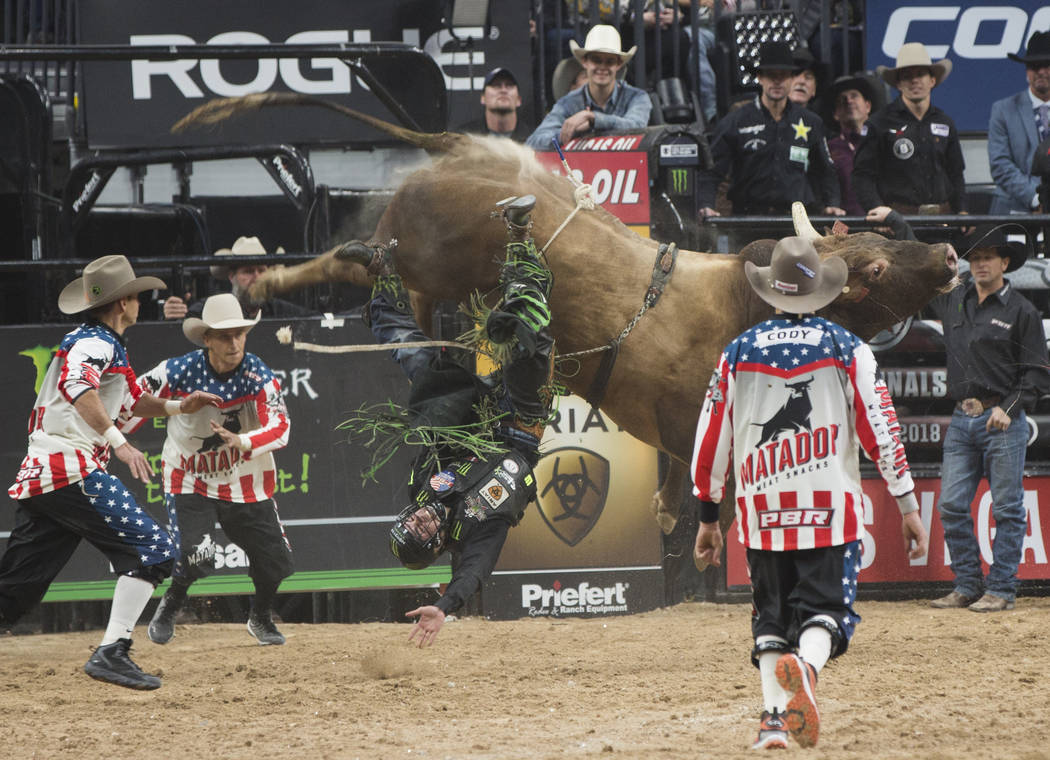 Jose Vitor Leme gets thrown from "Frequent Flyer" during the Professional Bull Riders World Finals on Sunday, November 11, 2018, at T-Mobile Arena, in Las Vegas. Benjamin Hager Las Vegas ...