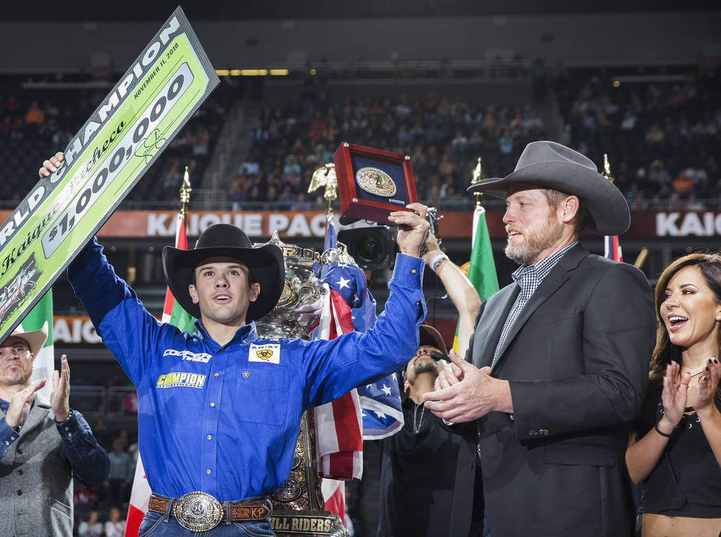 Kaique Pacheco, left, celebrates after winning the Professional Bull Riders World Championship on Sunday, November 11, 2018, at T-Mobile Arena, in Las Vegas. Benjamin Hager Las Vegas Review-Journal