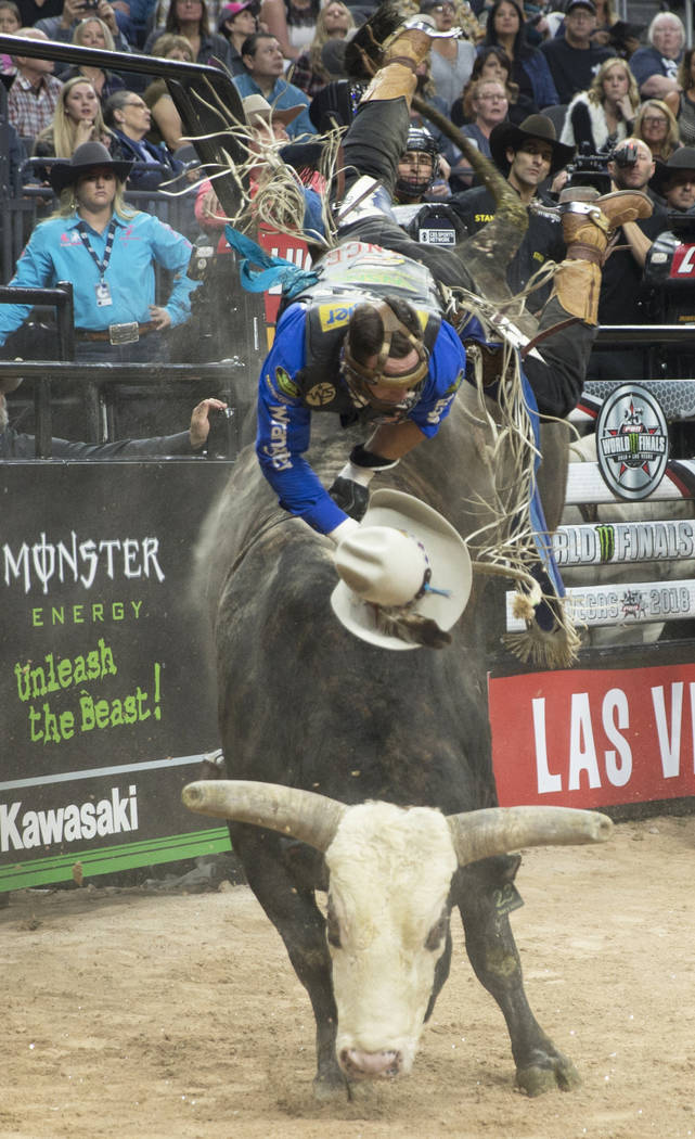 Cody Nance gets thrown off of "No Prisoners" during the Professional Bull Riders World Finals on Sunday, November 11, 2018, at T-Mobile Arena, in Las Vegas. Benjamin Hager Las Vegas Revi ...