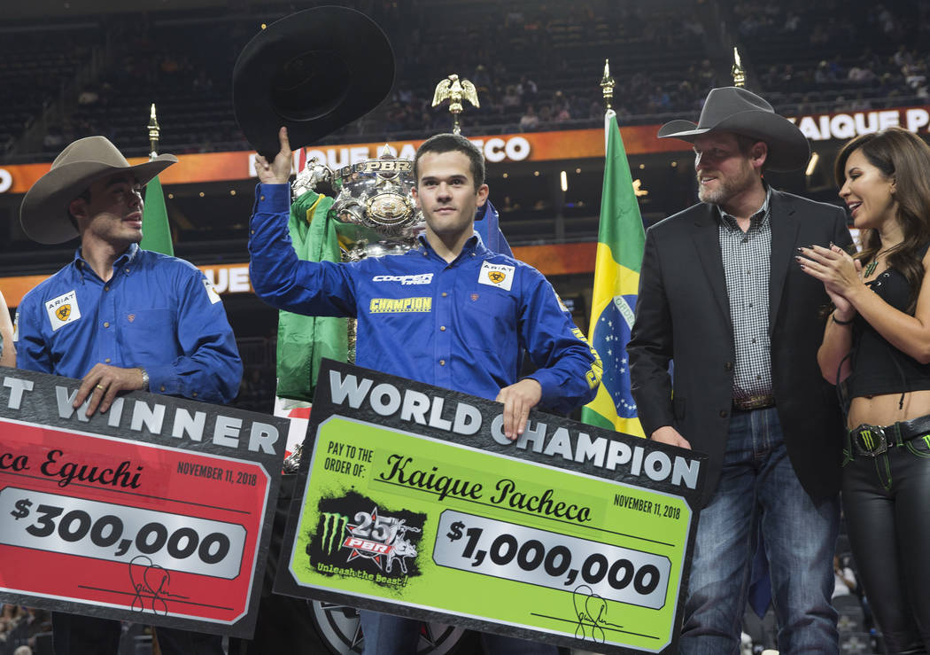 Kaique Pacheco, middle, celebrates after winning the Professional Bull Riders World Championship on Sunday, November 11, 2018, at T-Mobile Arena, in Las Vegas. Benjamin Hager Las Vegas Review-Journal
