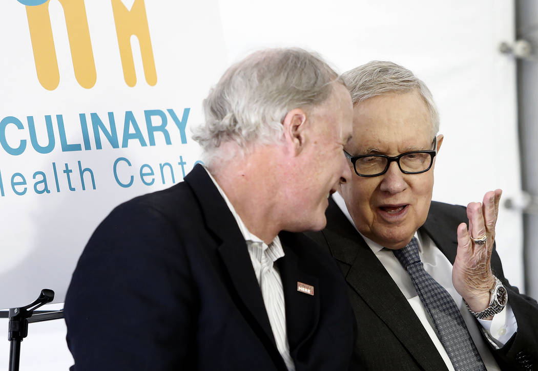 U.S. Senator Harry Reid, D-Nevada, right, chats with D. Taylor, president of UNITE HERE, during the grand opening ceremony of Culinary Health Center on Thursday, June 15, 2017, in Las Vegas. Bizua ...