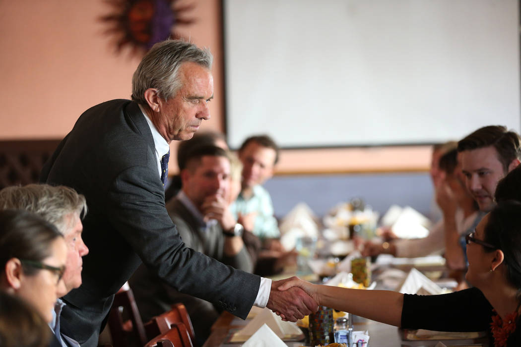 Bobby Kennedy Jr., left, Waterkeeper Alliance president, greets attendees during a kick-off event for the Las Vegas affiliate chapter of the Colorado Riverkeeper, at Doña Maria Tamales restau ...