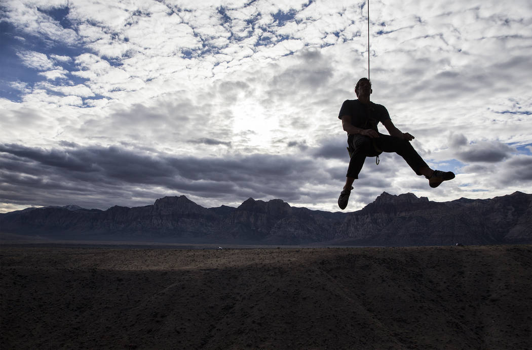 Alex Honnold descends The Gallery at Red Rock Canyon on Monday, Dec. 17, 2018, in Las Vegas. Ho ...