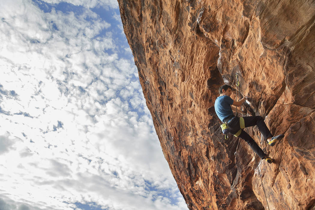 Alex Honnold ascends The Gallery at Red Rock Canyon on Monday, Dec. 17, 2018, in Las Vegas. Hon ...