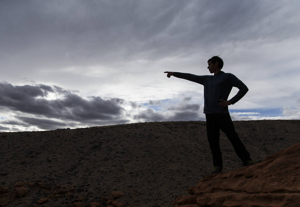 Alex Honnold points out features of climbing spots at Red Rock Canyon on Monday, Dec. 17, 2018, ...