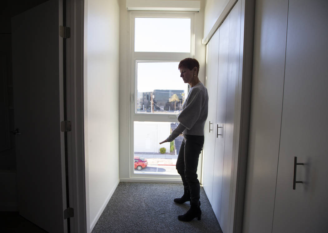 Beverly Rogers walks through a residential unit at The Lucy, a multipurpose creative residency ...