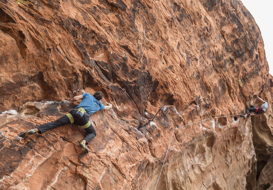 Alex Honnold ascends The Gallery at Red Rock Canyon on Monday, Dec. 17, 2018, in Las Vegas. Hon ...