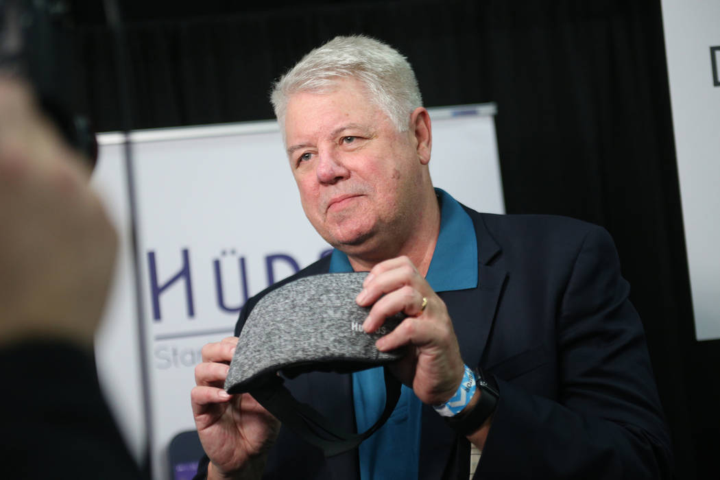 Curtis Ray, founder of HYpnos, holds the HYpnos sleep mask that is a self-learning snore-reduction mask at the CES Unveiled event for media prefacing the tech mega-conference at Mandalay Bay in La ...