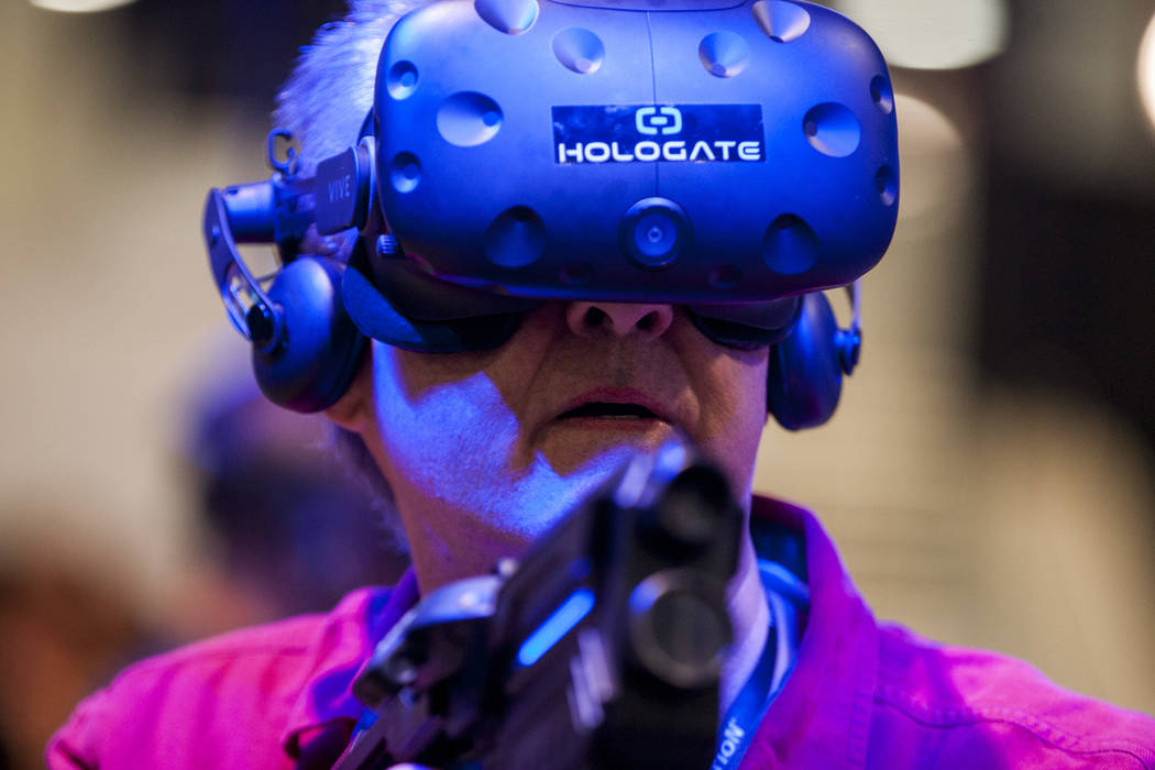Charles Womack tries out a virtual reality game at the Las Vegas Convention Center on Tuesday, March 27, 2018. Patrick Connolly Las Vegas Review-Journal @PConnPie