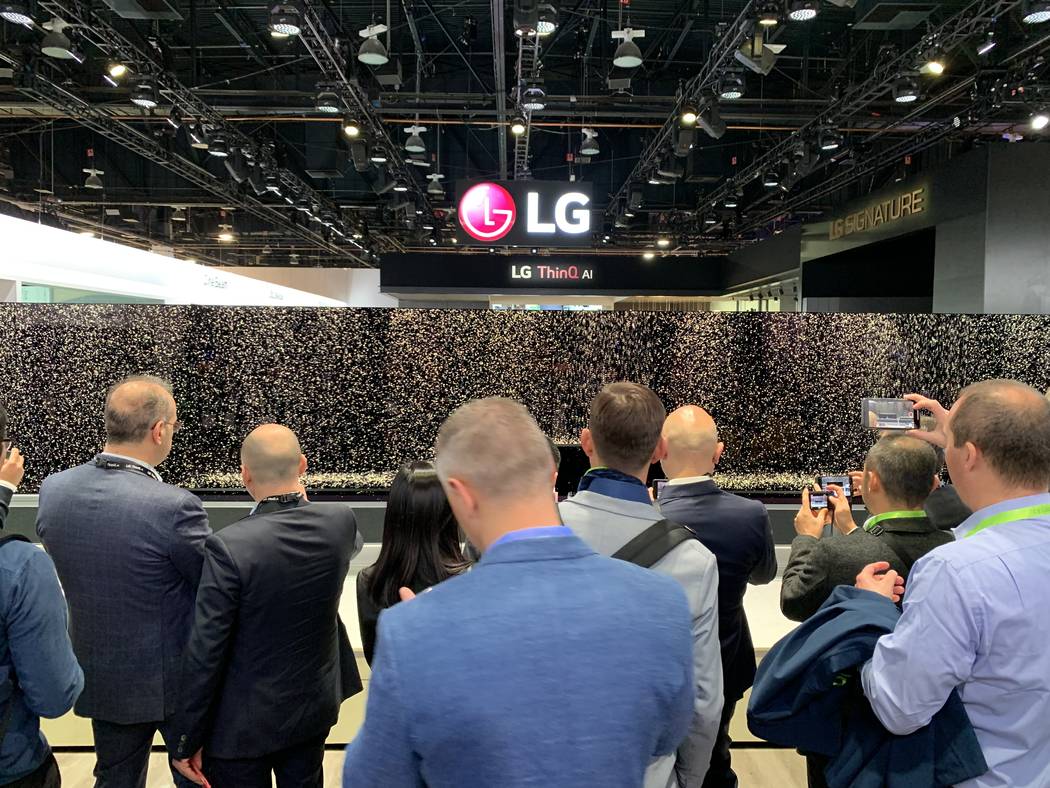 People lining up at the LG booth at CES at the Las Vegas Convention Center to see their new rollable TV screen on Tuesday, Jan. 8, 2018 in Las Vegas. Todd Prince/Las Vegas Review-Journal