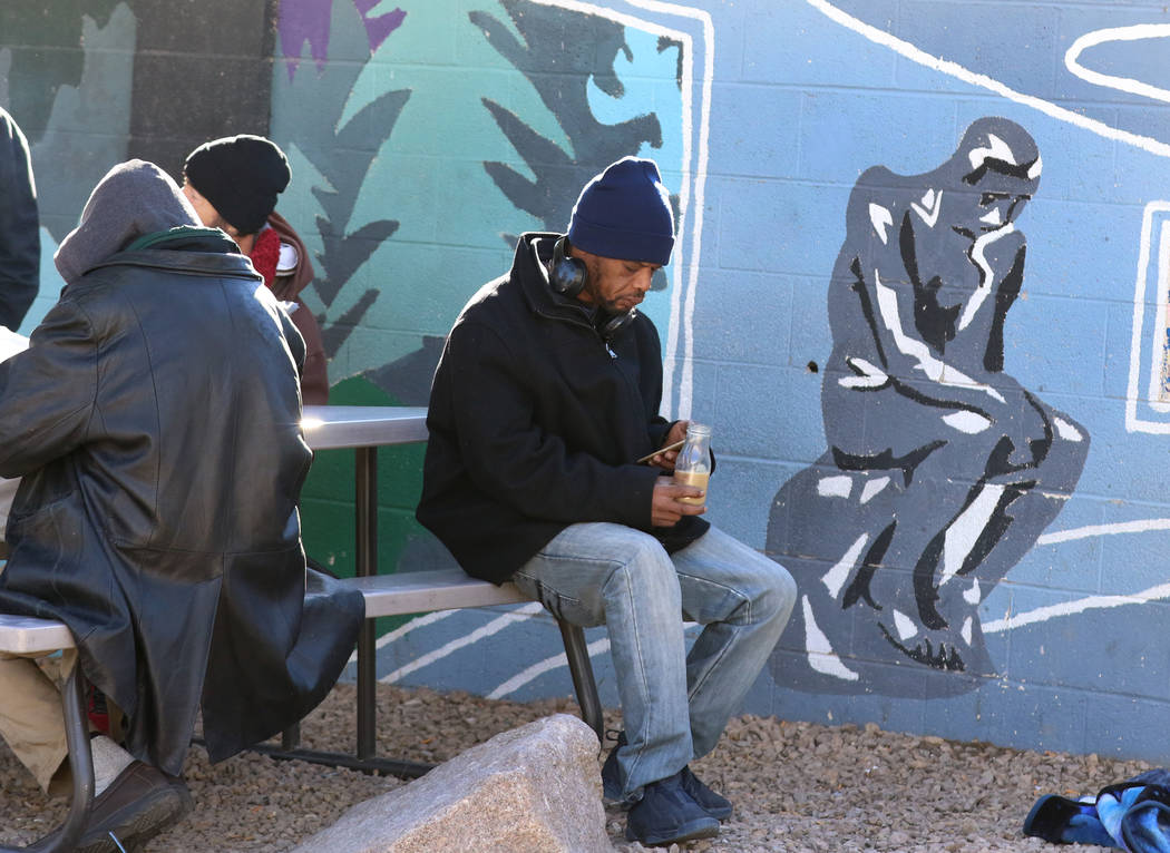 Clients relax at Las Vegas’ homeless courtyard on Tuesday, Jan. 22, 2019, in Las Ve ...