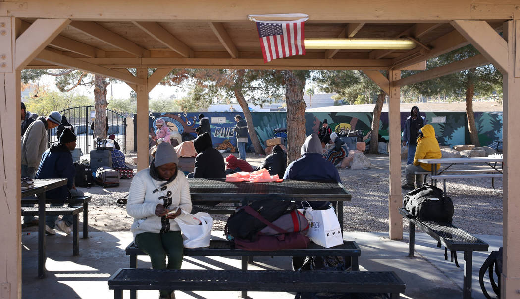 Clients relax at the city of Las Vegas' homeless courtyard on Tuesday, Jan. 22, 2019, in Las Ve ...