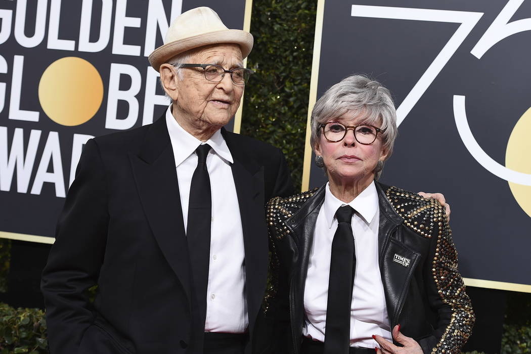 Norman Lear, left, and Rita Moreno arrive at the 75th annual Golden Globe Awards at the Beverly ...