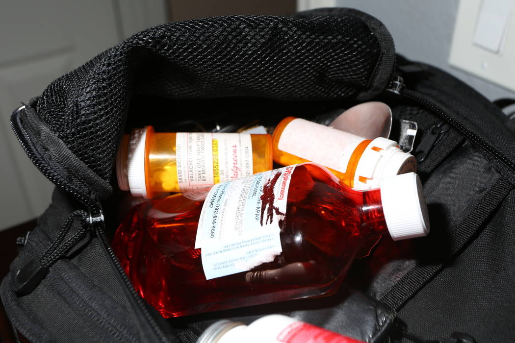 Henderson police discovered Officer David Sigmund's work backpack filled with prescription medi ...