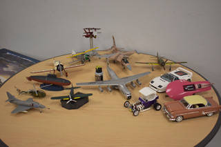 Some aircraft and automotive models showcased at the International Modelers Society meeting of ...