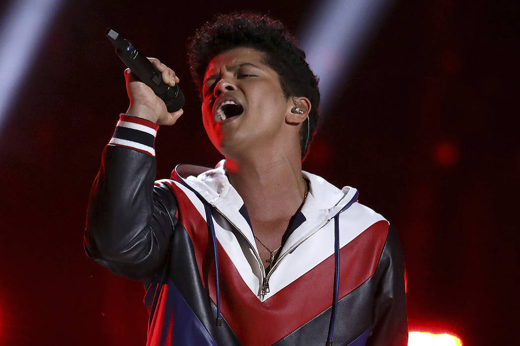 Bruno Mars performs Feb. 12, 2017, at the 59th annual Grammy Awards in Los Angeles. Mars, (Phot ...