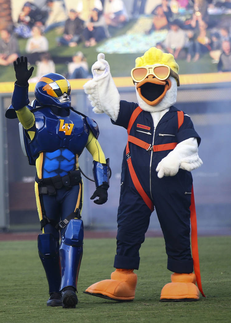 Mascot Spruce the Goose, right, introduces Mr. Aviator before the start of the Las Vegas Aviato ...