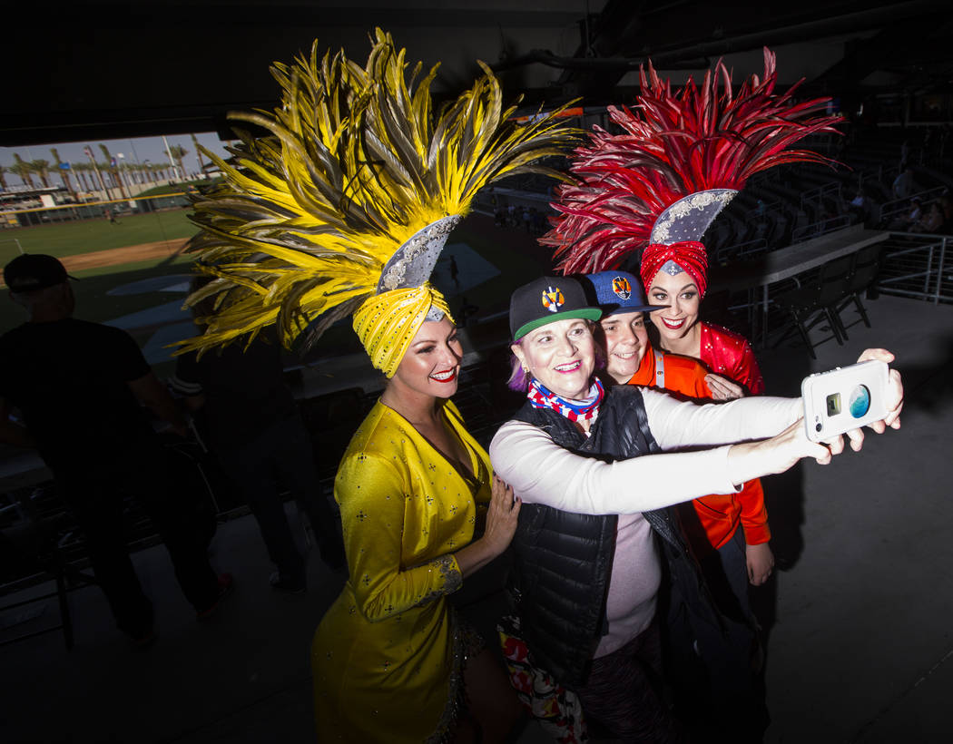 Christina Middlebrook, second from left, poses with her son, Joseph, 15, and showgirls Jenn Vos ...