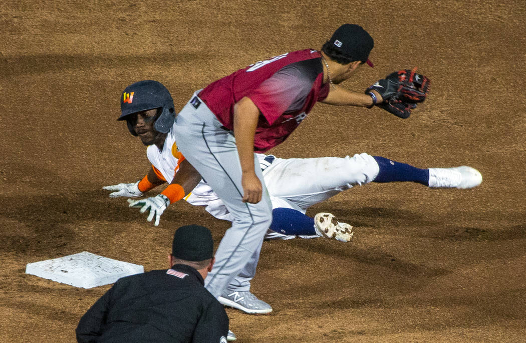 Las Vegas Aviators shortstop Jorge Mateo (14) reaches for second base as Sacramento River Cats ...