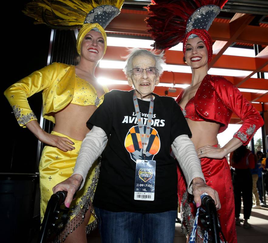 Valeria Greene, 95, of Las Vegas poses with showgirls Jen Vossmer, left, and Brooke Brown after ...