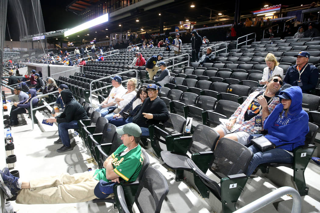 Fans take in the action during the fourth inning on opening night for the Las Vegas Aviators at ...