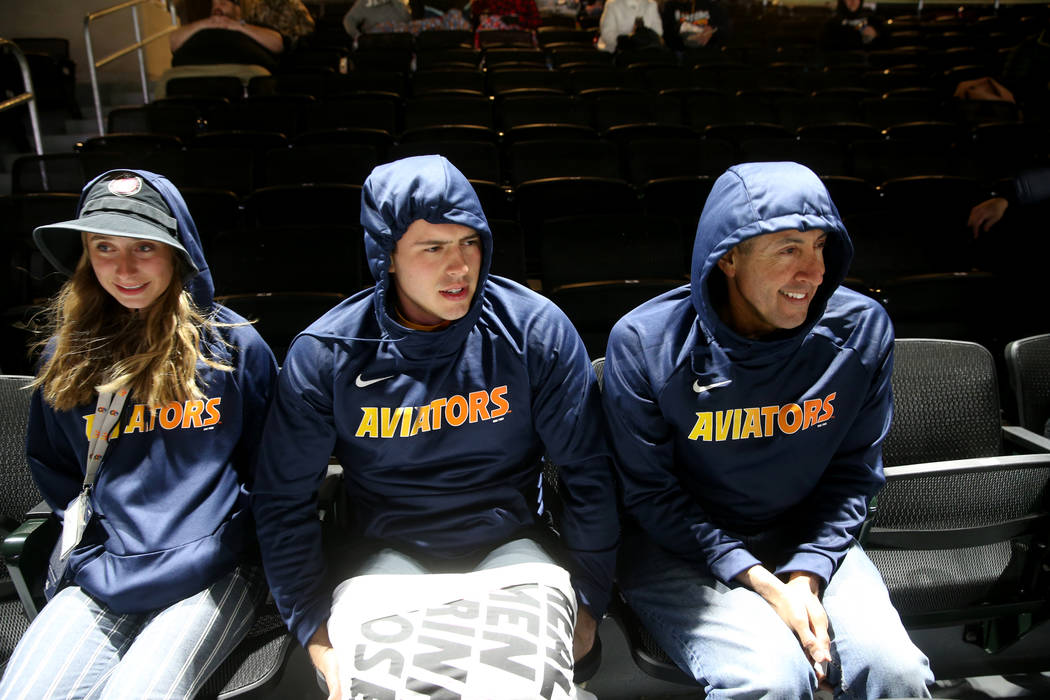 Sofia Serrano, 15, her brother Ray Serrano, 20, and father Danny Serrano, 42, don new hoodies t ...