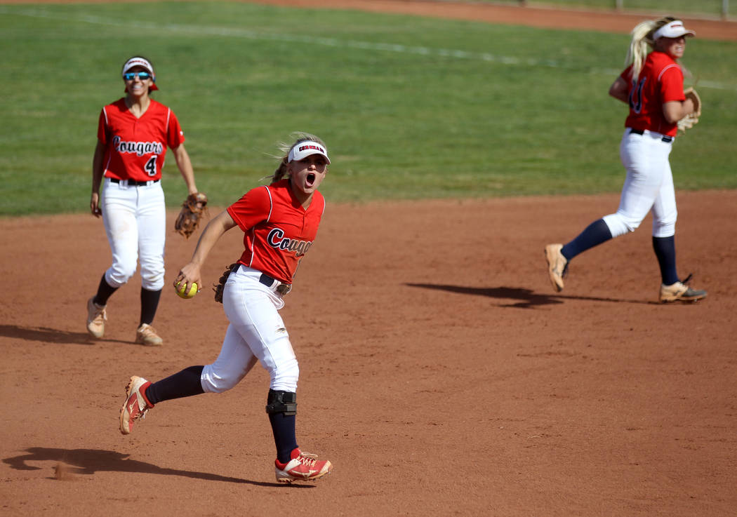 Coronado shortstop Paige Sinicki (12) reacts after tagging out a Basic baserunner during their ...