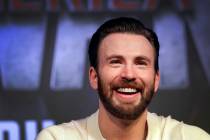 Chris Evans who plays the main character Steve Rogers or Captain America, speaks to members of ...