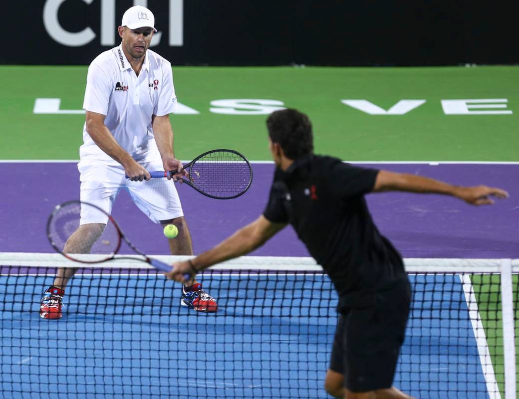 Andy Roddick, left, and Mark Philippoussis compete during a World Team Tennis charity exhibitio ...