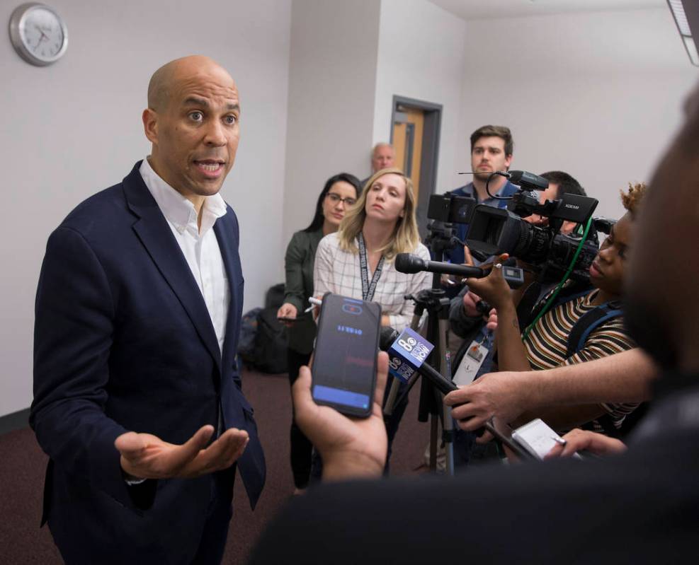 Democratic presidential candidate Sen. Cory Booker, D-N.J. takes questions from the media befor ...