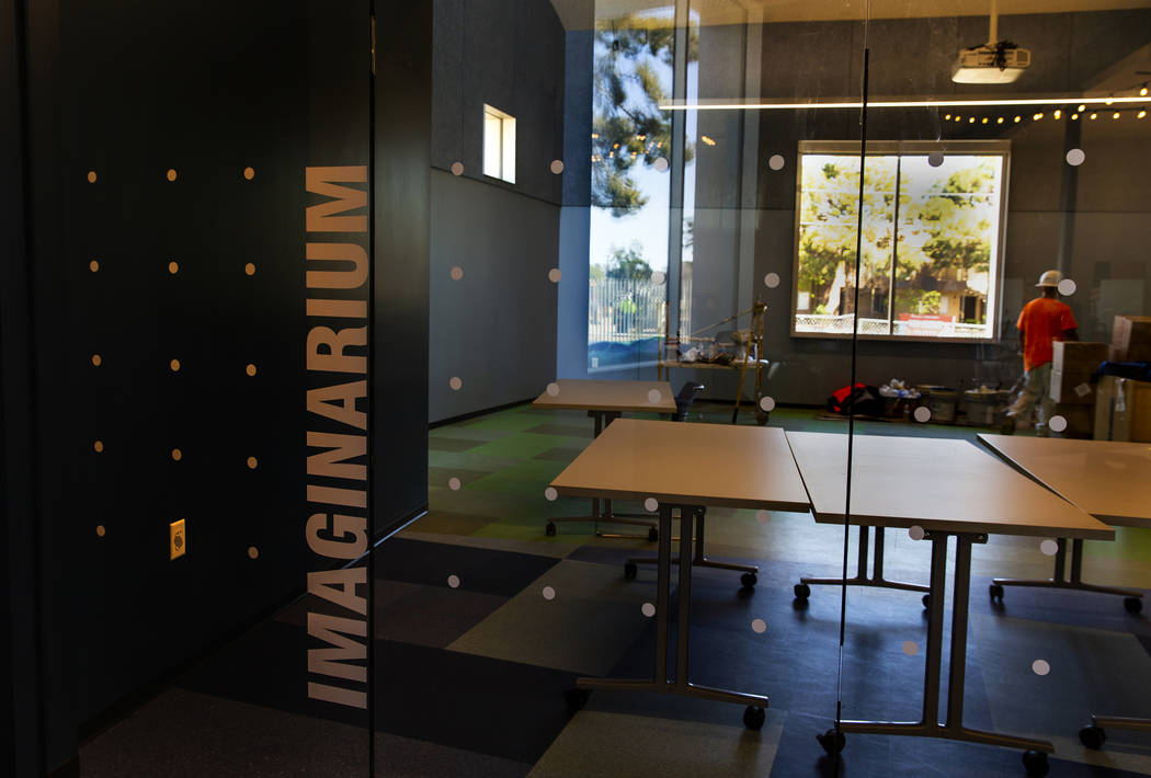 Work continues in the Imaginarium where kids can hear stories, create and play within the new E ...