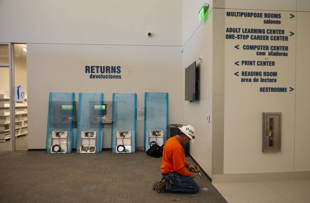 Directions to the various rooms are posted as work continues on the new East Las Vegas Library, ...