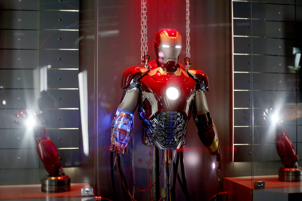 An recreated prop of an Iron Man suit at the Avengers S.T.A.T.I.O.N interactive exhibit at Trea ...