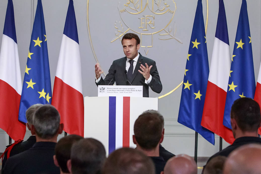 French President Emmanuel Macron addresses Paris Firefighters' brigade and security forces who ...