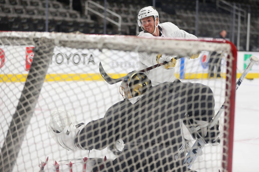 Vegas Golden Knights center Jonathan Marchessault (81) takes a shot during a team practice befo ...