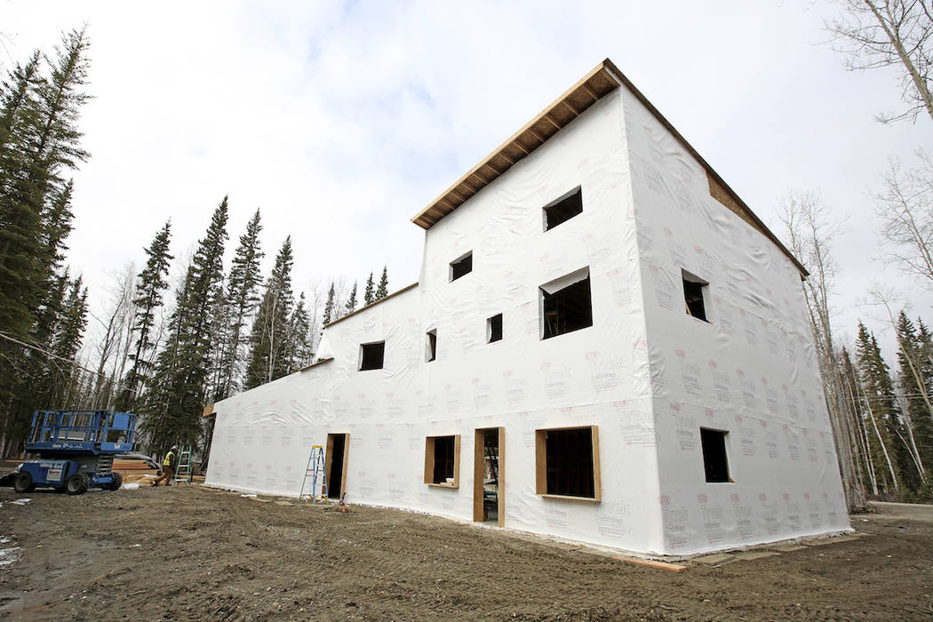 In this photo taken Wednesday, April 17, 2019, is a home under construction for the family of s ...