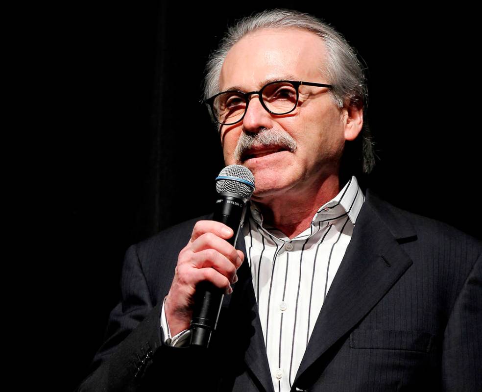 FILE - In this Jan. 31, 2014 photo, David Pecker, Chairman and CEO of American Media, addresses ...