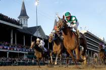 Joel Rosario rides Accelerate to victory in the Breeders' Cup Classic horse race at Churchill D ...