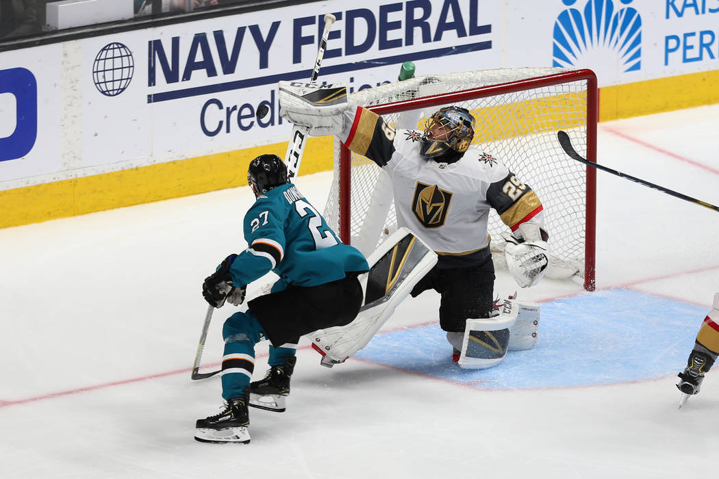 Vegas Golden Knights goaltender Marc-Andre Fleury (29) defends a shot from San Jose Sharks righ ...