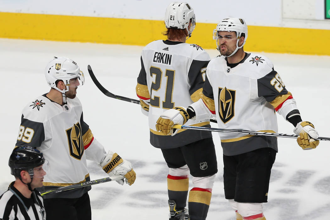 Vegas Golden Knights left wing William Carrier (28) with right wing Alex Tuch (89) and center C ...