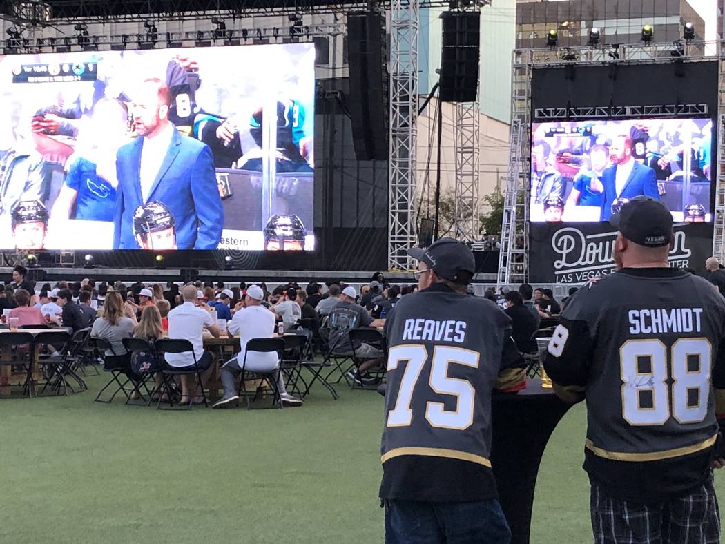 Brothers Darren Navin, left, and Chad Navin preparing to watch the fifth game in the playoff se ...