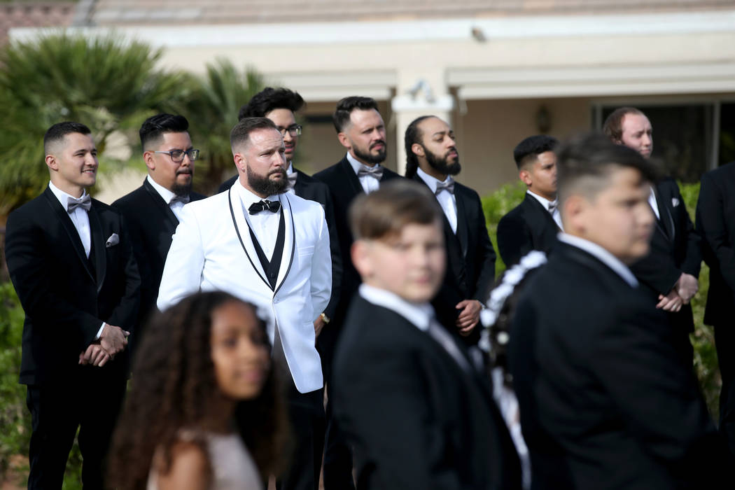 William King cries upon seeing his bride Kimberly at the Revere Golf Club in Henderson Friday, ...