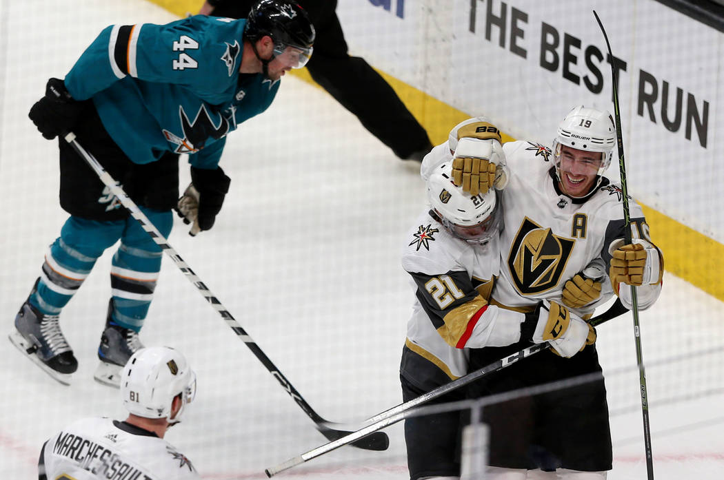 Vegas Golden Knights right wing Reilly Smith (19) celebrates a score with center Cody Eakin (21 ...