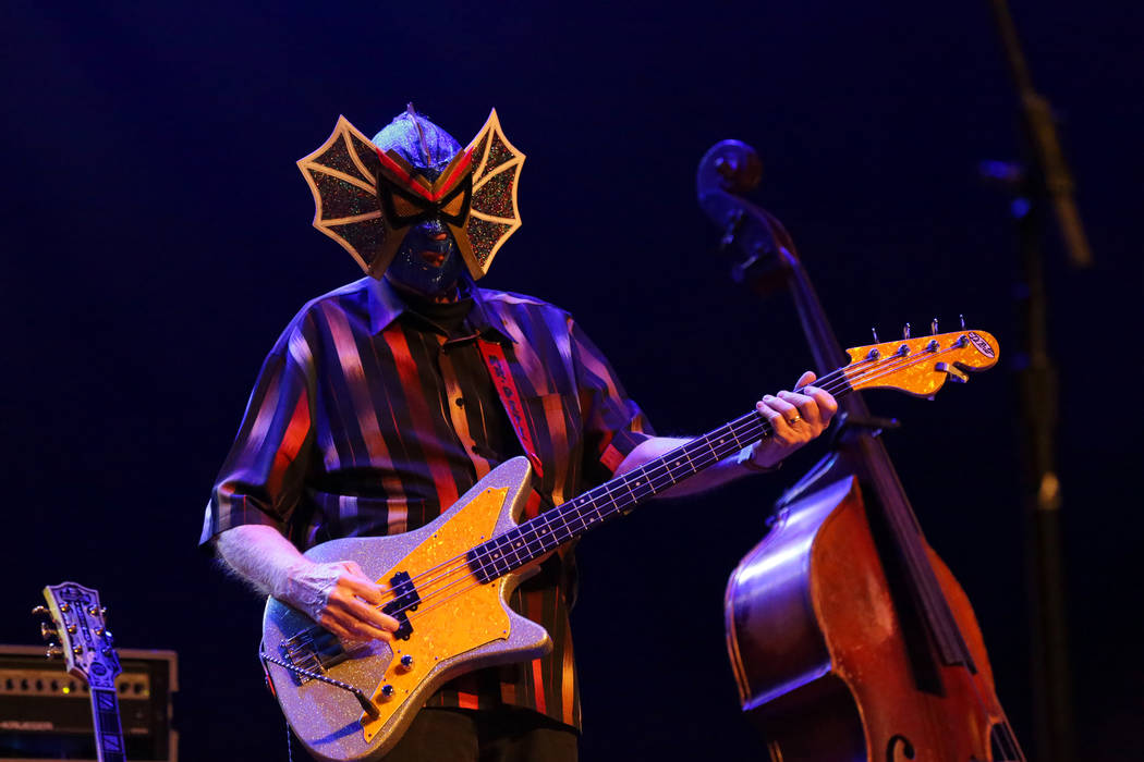 Pete Curry, bassist for Los Straitjackets, performs at the Deke Dickerson Guitar Geek Festival ...